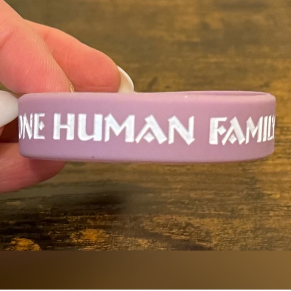 Purple Wristband with White Text